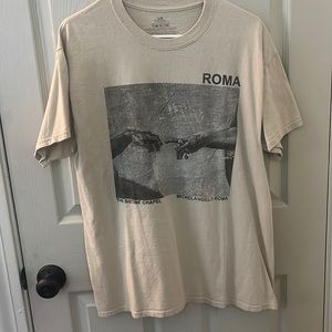 Tan t-shirt bought from Philco. Size Medium.